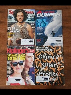 Set of Four Assorted Magazines with Red, Blue, Black, Brown Covers